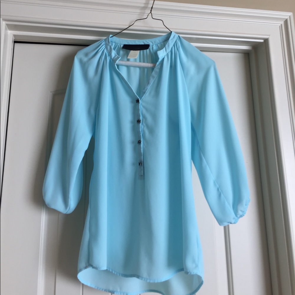Light blue top