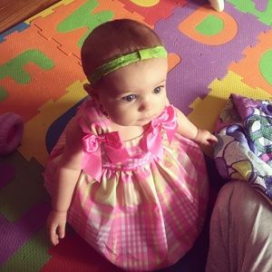 Pink poofy dress with green check