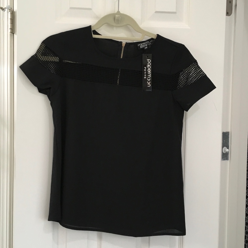 Black blouse with gold zipper on back