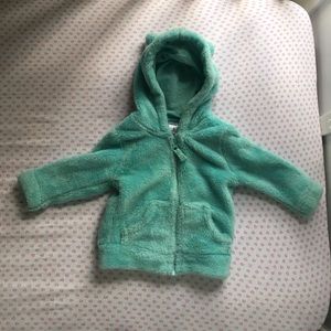 Furry teal sweatshirt with hoodie ears