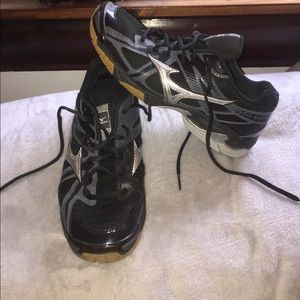 Mizuno black and silver volleyball shoes.