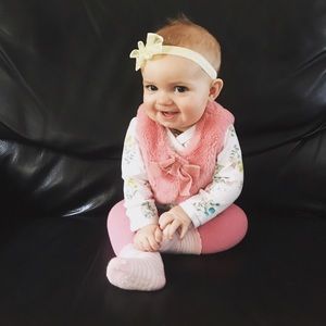 Pink fur vest with pretty bow