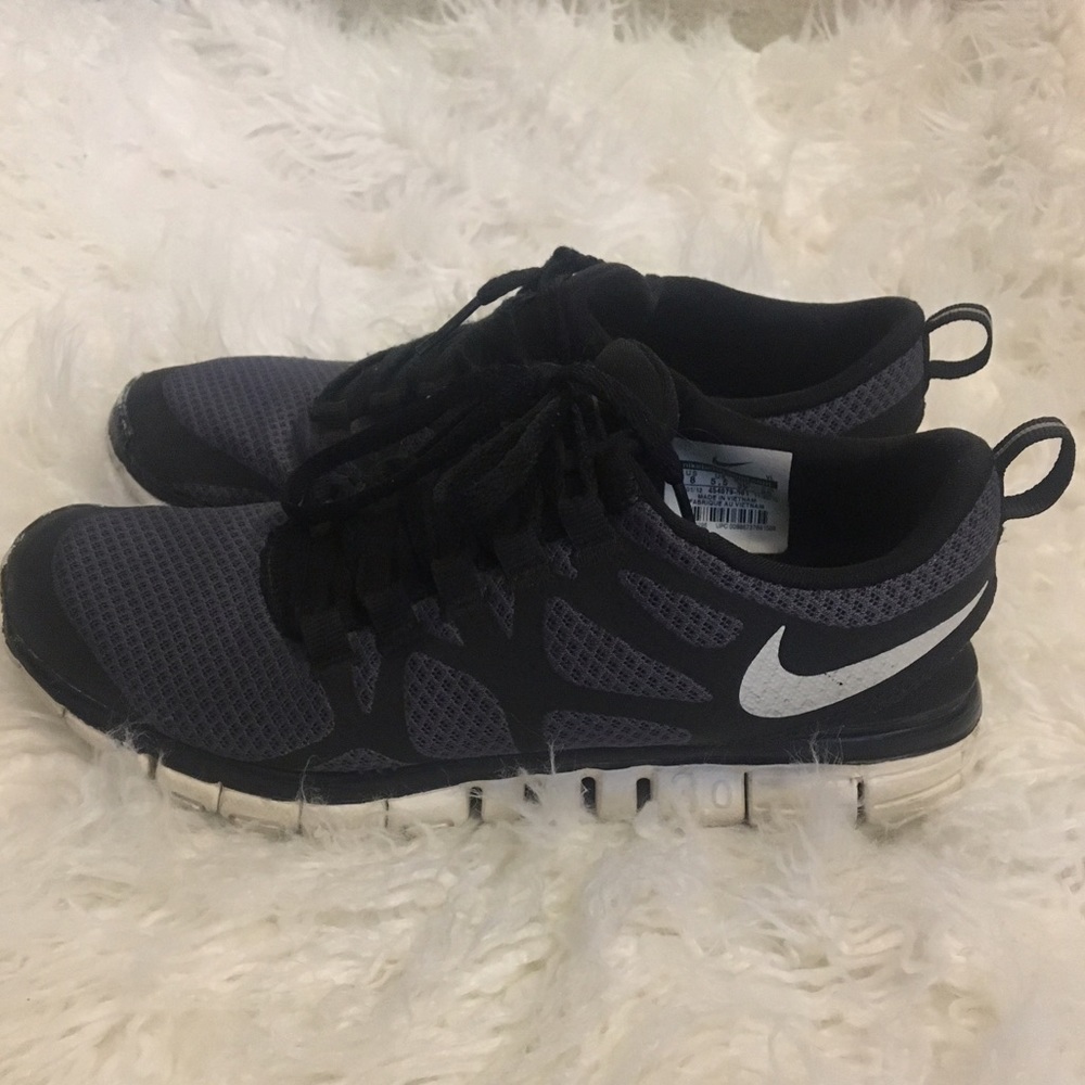 Black and grey Nike shoes