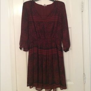 Red patterned dress.