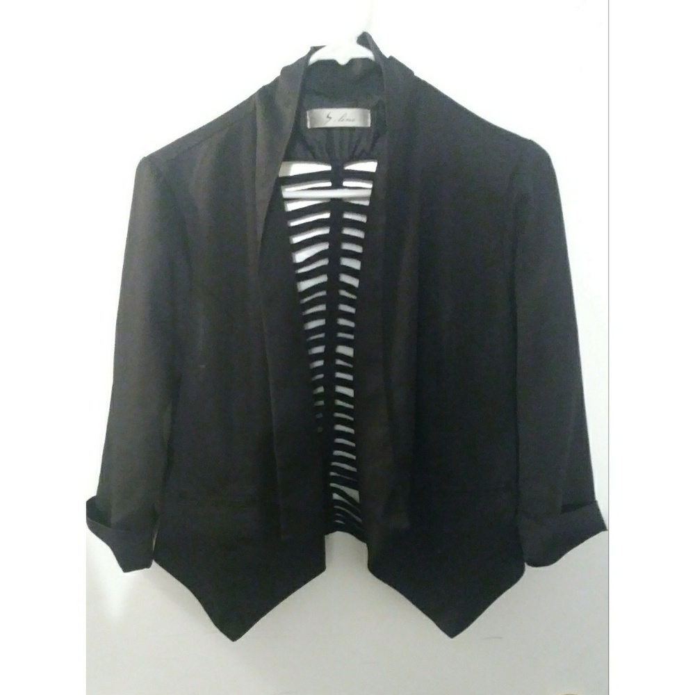 Black blazer , back cut ??