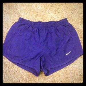 Purple Nike running shorts
