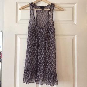 Purple, peacock print tunic with ruffled bottom