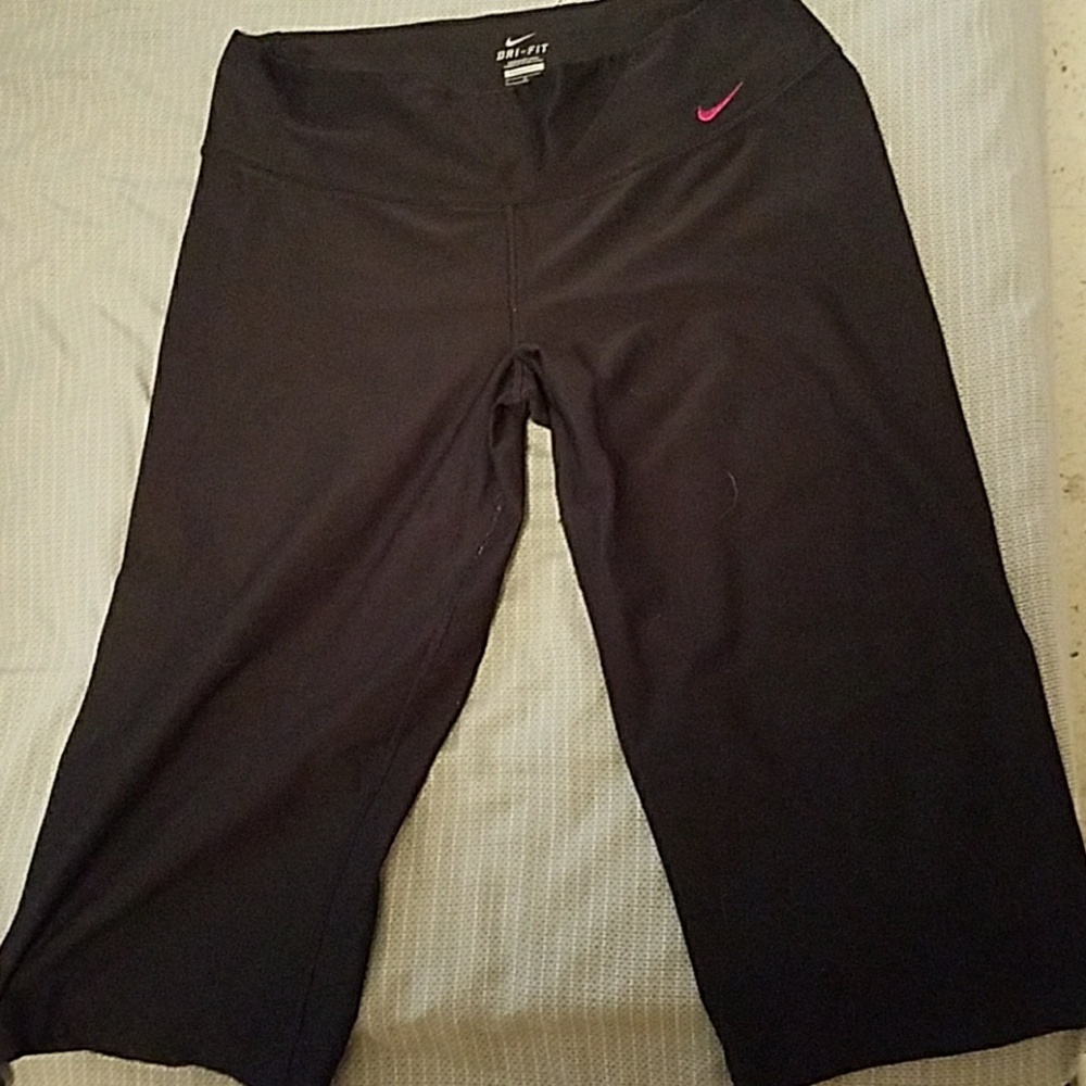 Black and pink nike capris