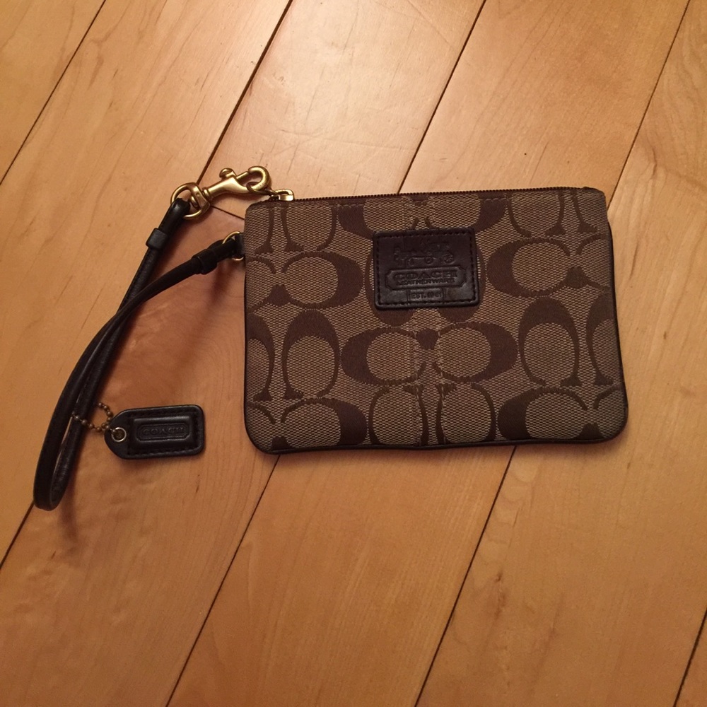 brown Coach wristlet