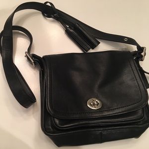 Coach leather black purse with tassels