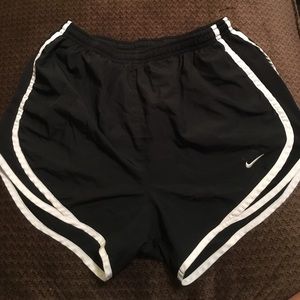 Black Nike running shorts