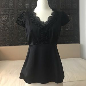 Nanette Lepore black top with lace trim