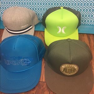 4 SnapBack Hats RVCA, HURLEY, RIP CURL, and VOLCOM