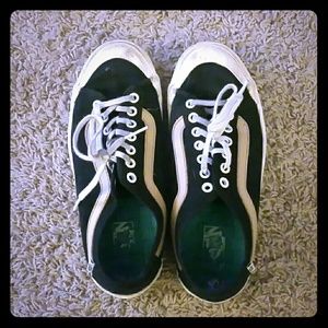 Vans black and tan shoes.