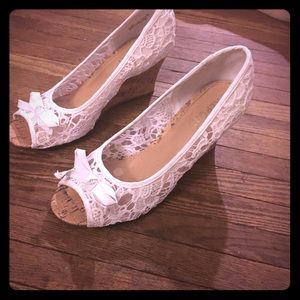 White lace wedge heels. Worn once.