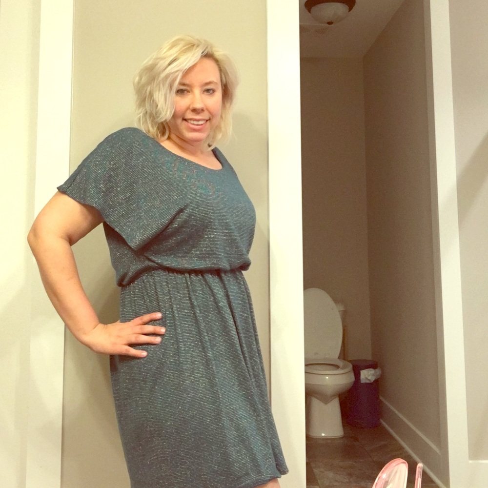 Size L green dress with sparkle throughout.