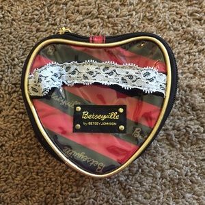 Betseyville small heart shaped makeup bag.