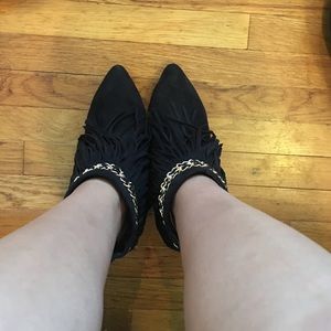 Black fringe booties with gold chain
