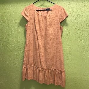 Blush colored GAP dress with ruffled bottom.