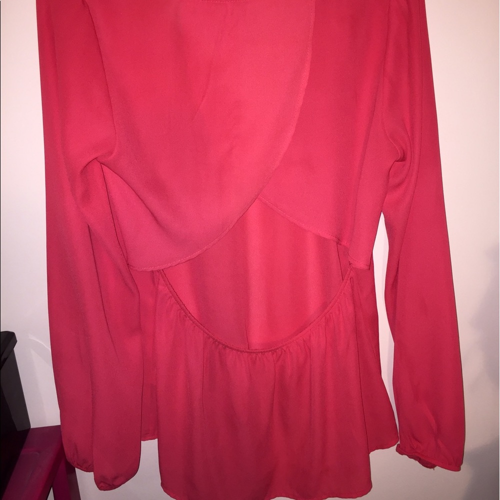 Pink opened back shirt