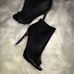 Peep toe leather booties w/ gold toe lining