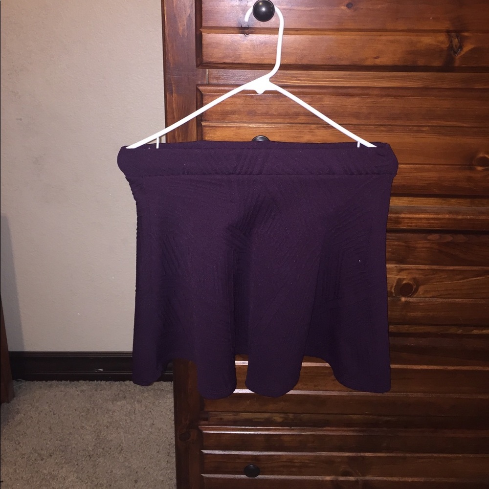 reddish purple skirt
