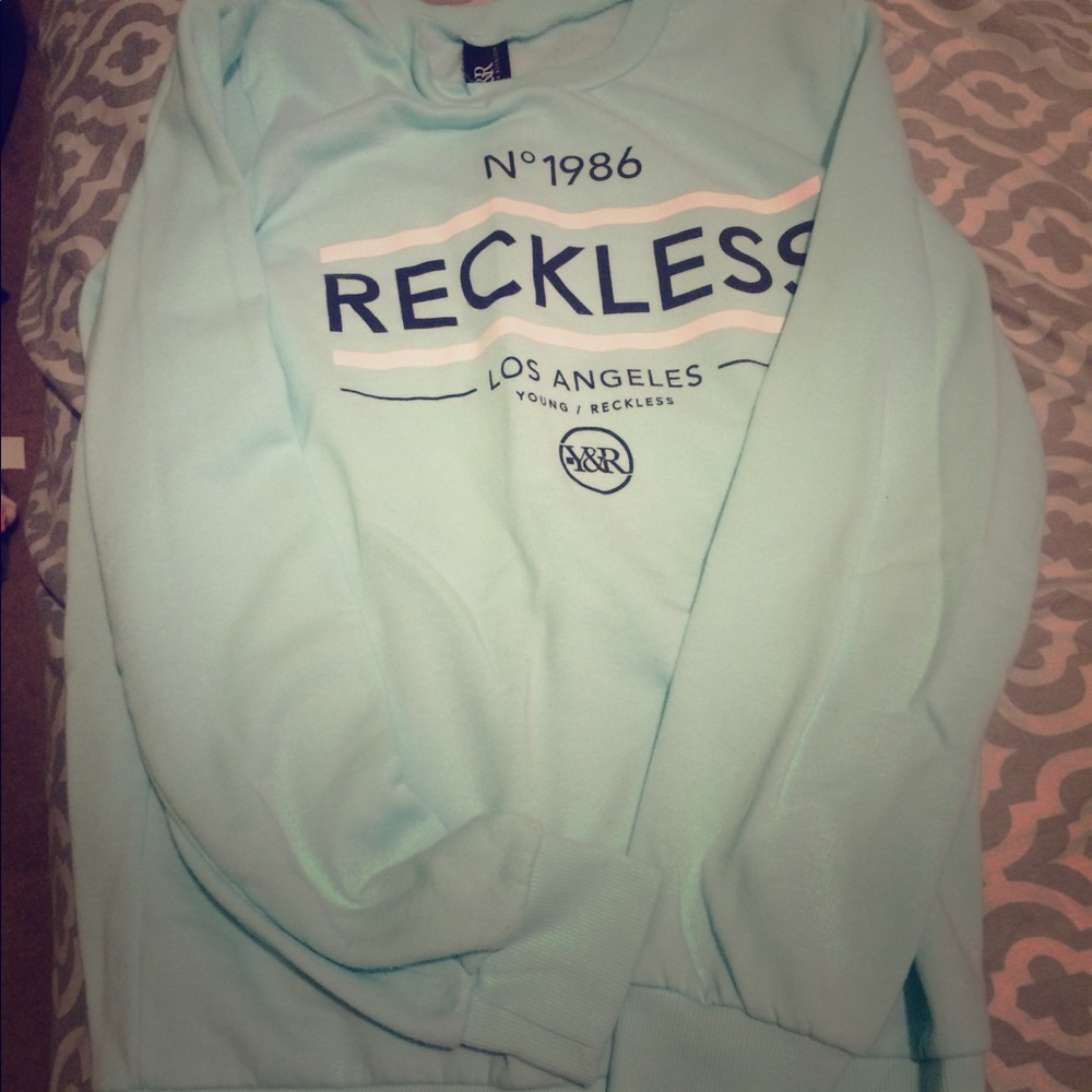 Reckless crew neck ladies size small