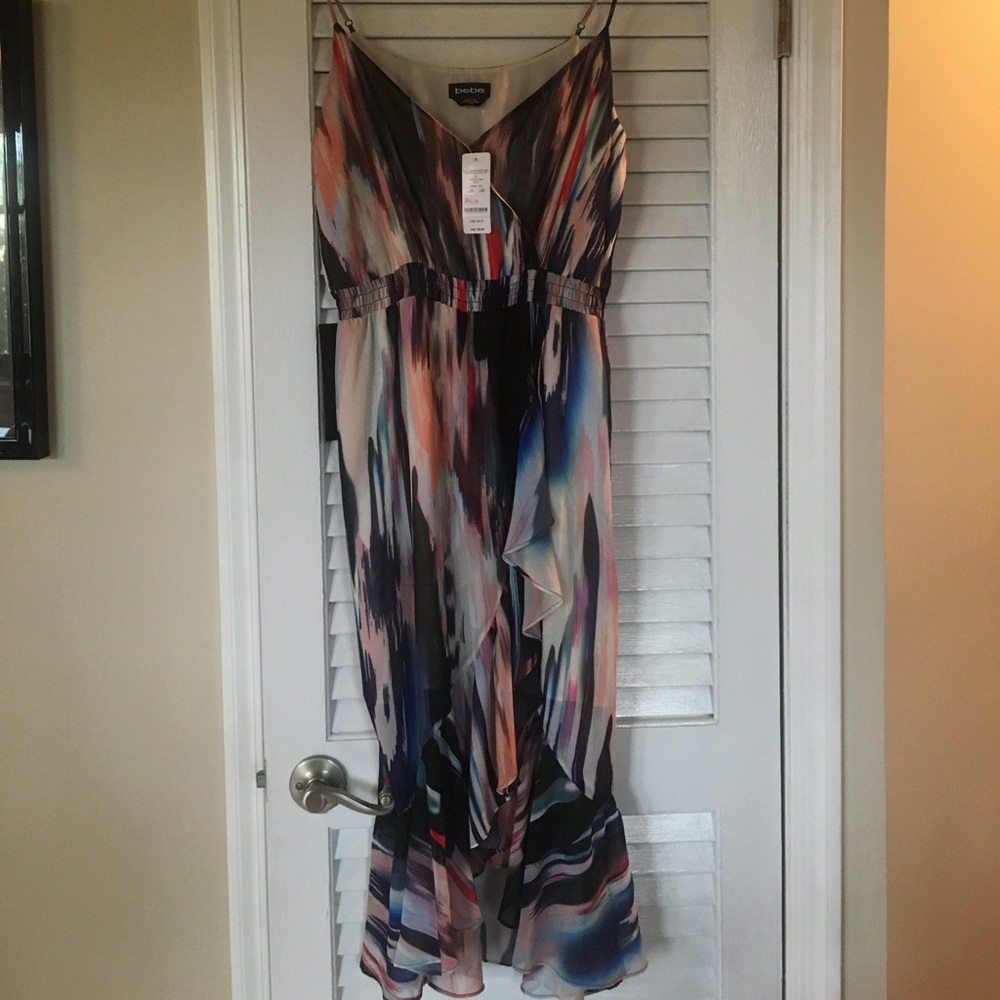 Bebe ruffle hem smocked hi-lo dress