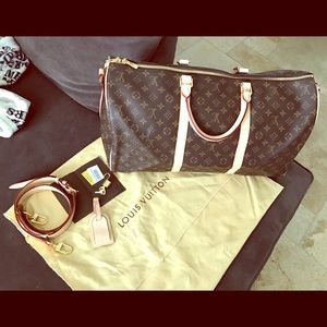 SOLD. Keepall Bandouliere 55