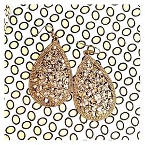 Large gold and crystal studded earrings