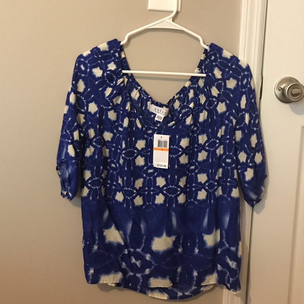 New with tags flowing patterned blouse