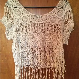 Bohemian crop top with a lot of detail.