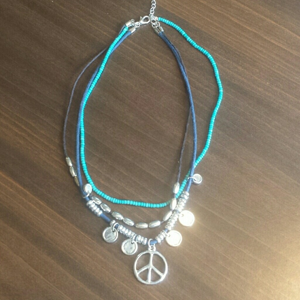 Cute necklace 14 inches long open peace symbol