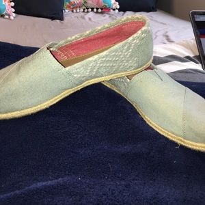 Toms never worn slip ons