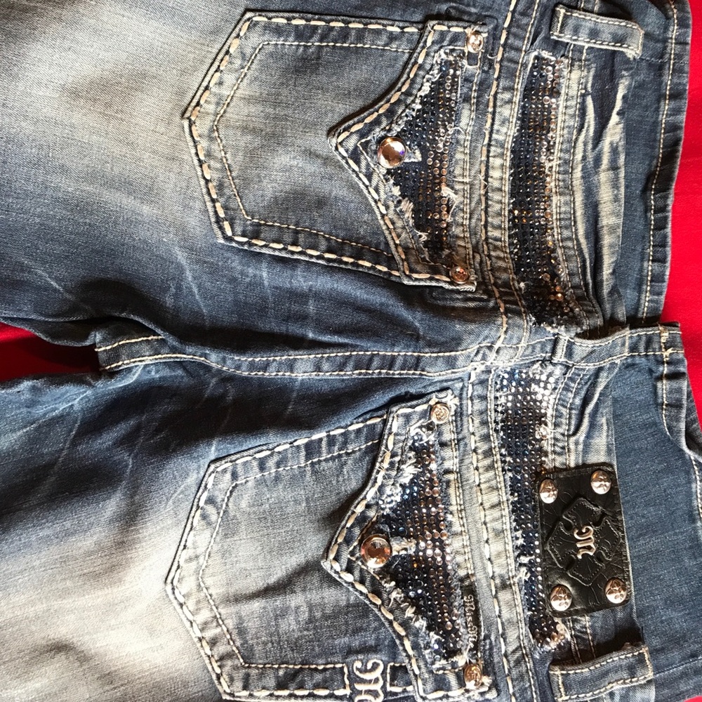 Miss me jeans.  Like new!