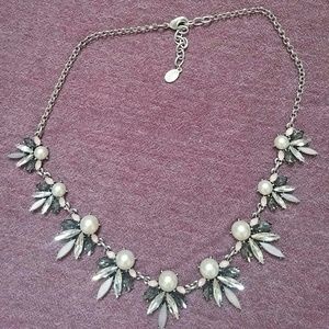 Multi colored starburst shaped silver necklace