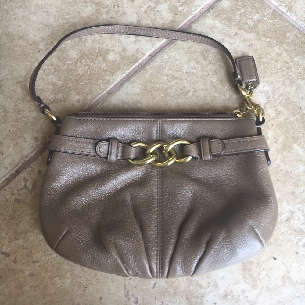 Coach Gold leather clutch
