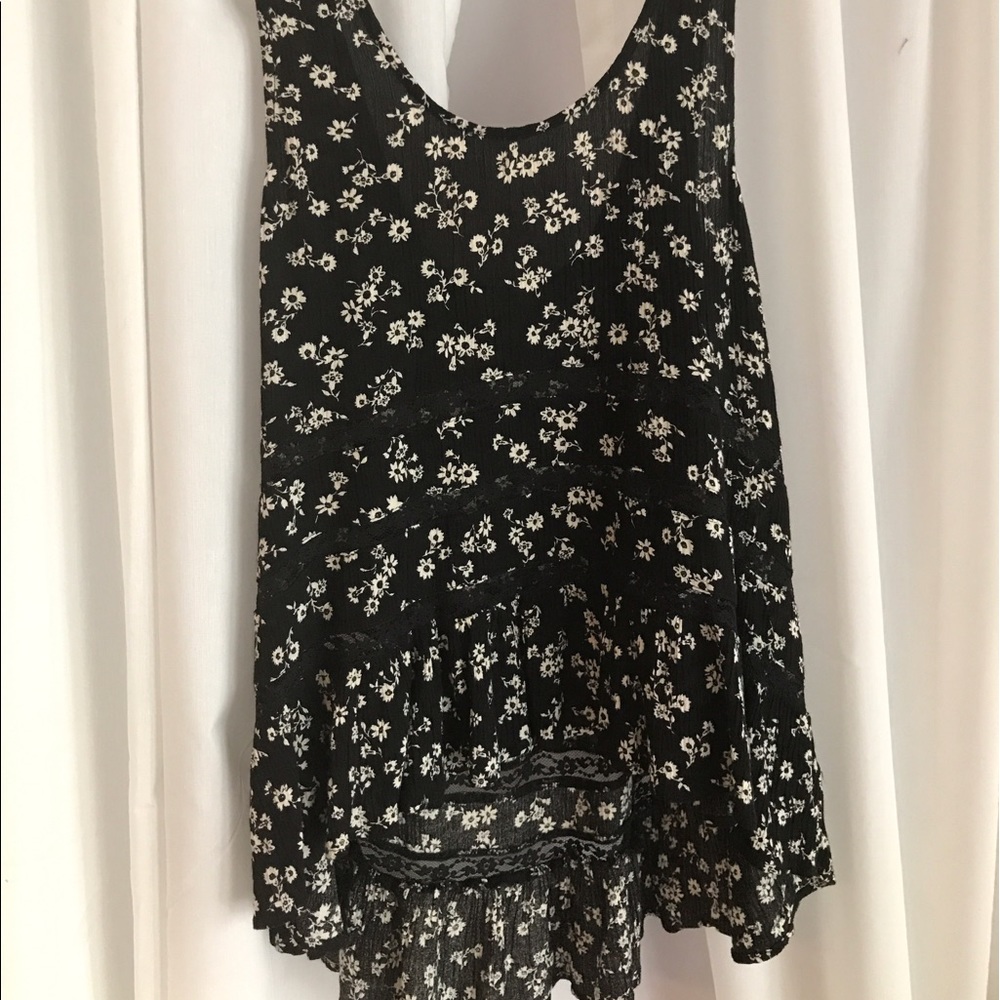 black flowy tank with cream flowers and lace