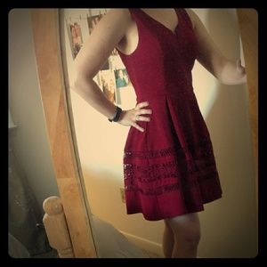 Deep red a line party dress with pleated detail