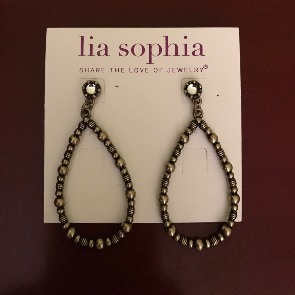 Lia Sophia gold oval earrings.