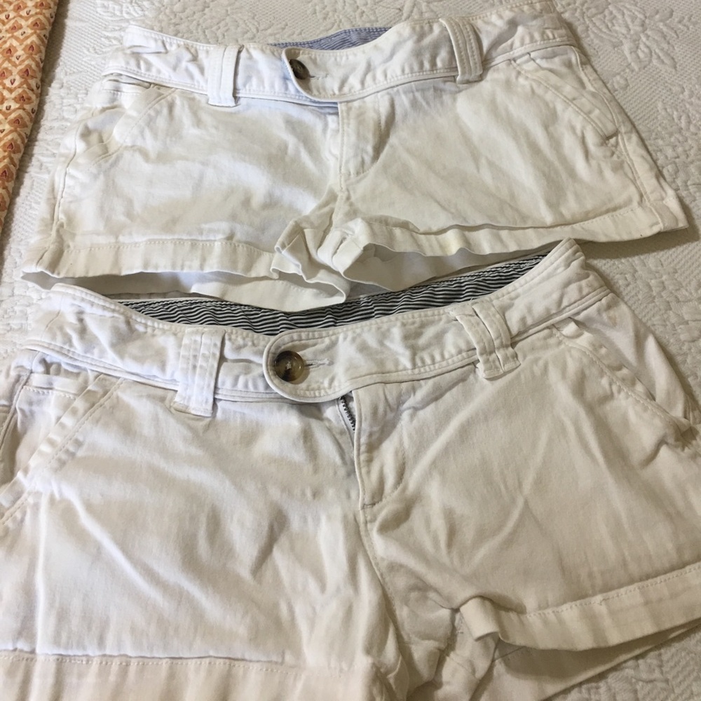 2 pair of white red Camel shorts
