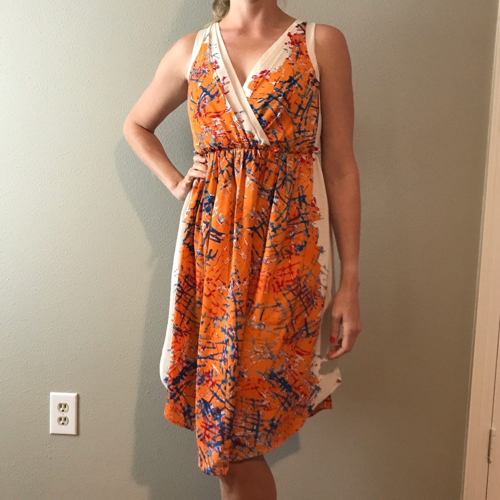 Anthropologie cream and orange empire dress.