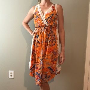 Anthropologie cream and orange empire dress.