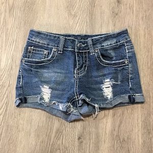 Distressed denim shorts