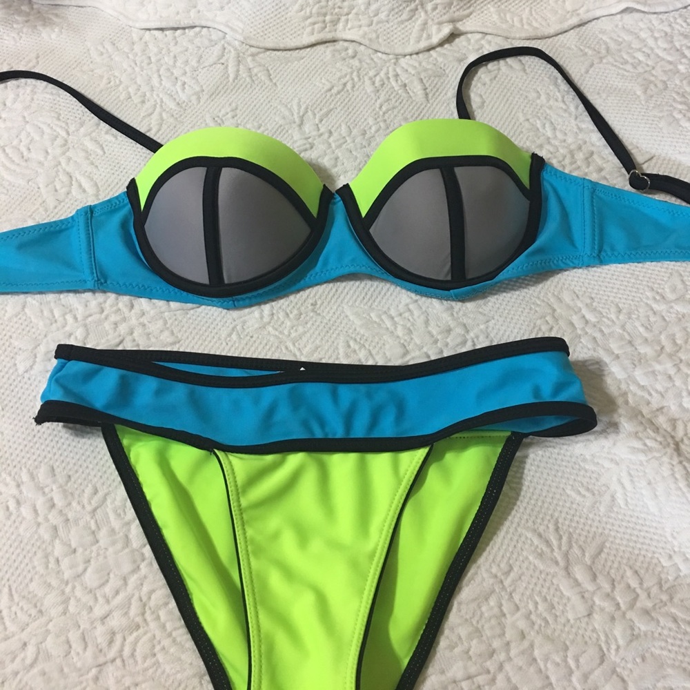 Triangular bathing suit top with bottoms