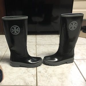 Tory Burch black rain boots.
