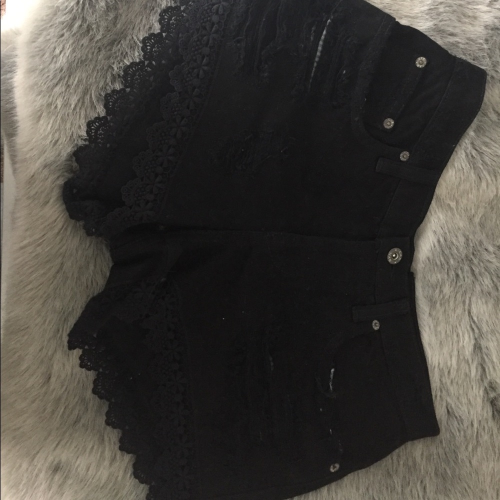 LF black ripped shorts