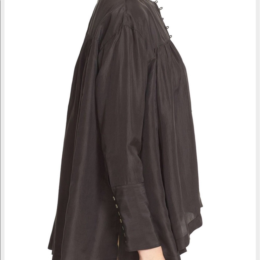 Free people black colored flared blouse
