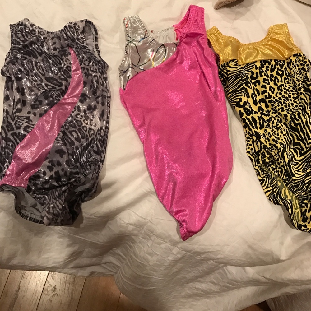 Children medium gymnastic leotards.