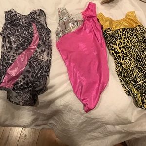Children medium gymnastic leotards.